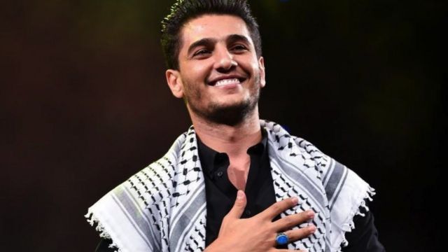 بعد الجدل الواسع.. سبوتيفاي توضح سبب حذف أغنية "أنا دمي فلسطيني" للفنان محمد عساف